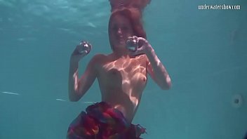 Redhead B. Nikita Vodorezova Gets Naked Fast Underwater free video